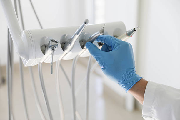 Professional Tooth Extraction technician working in Rockingham County County, VA